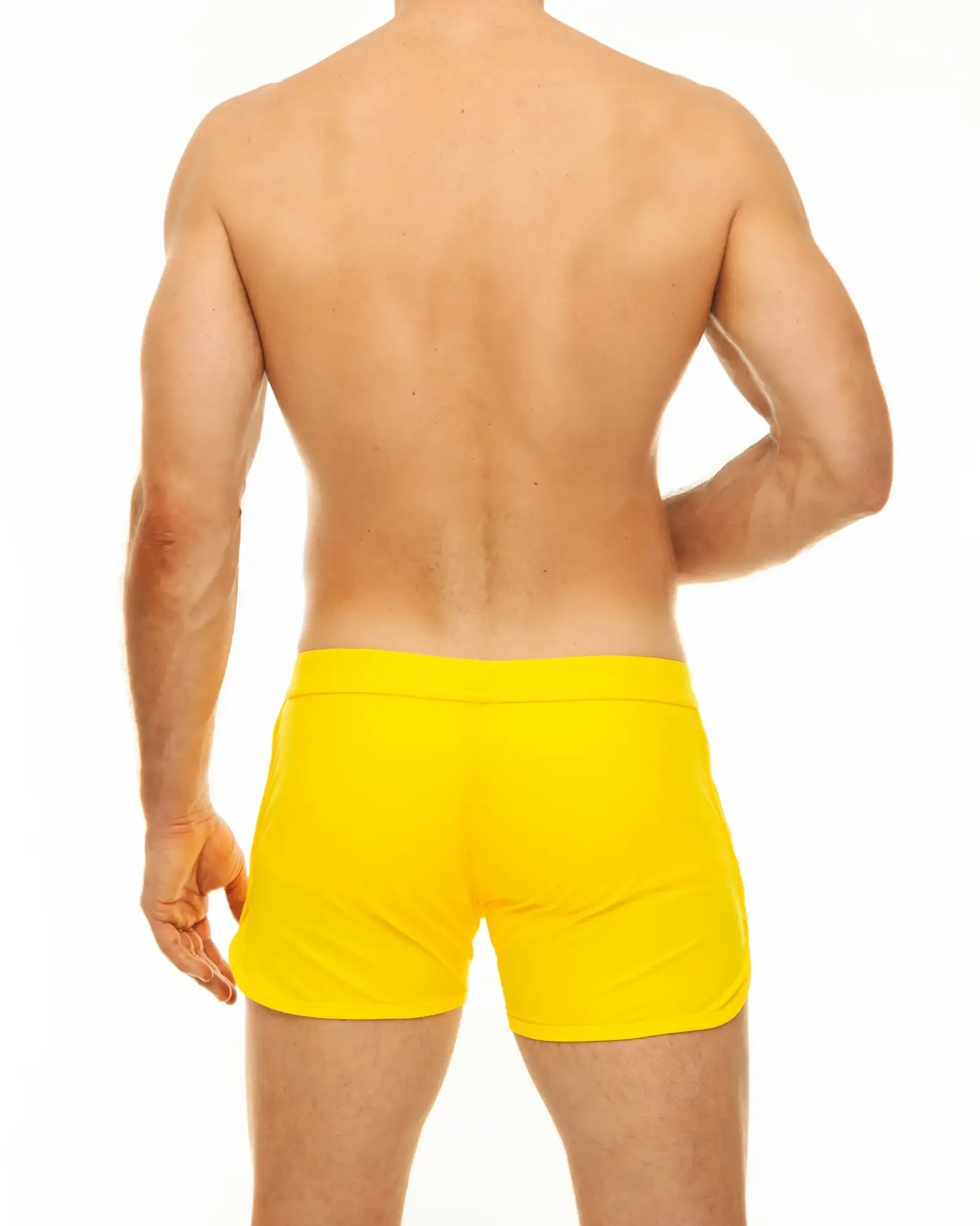Bright yellow along slit swim short swim trunks with a smooth fitted design for comfortable beachwear