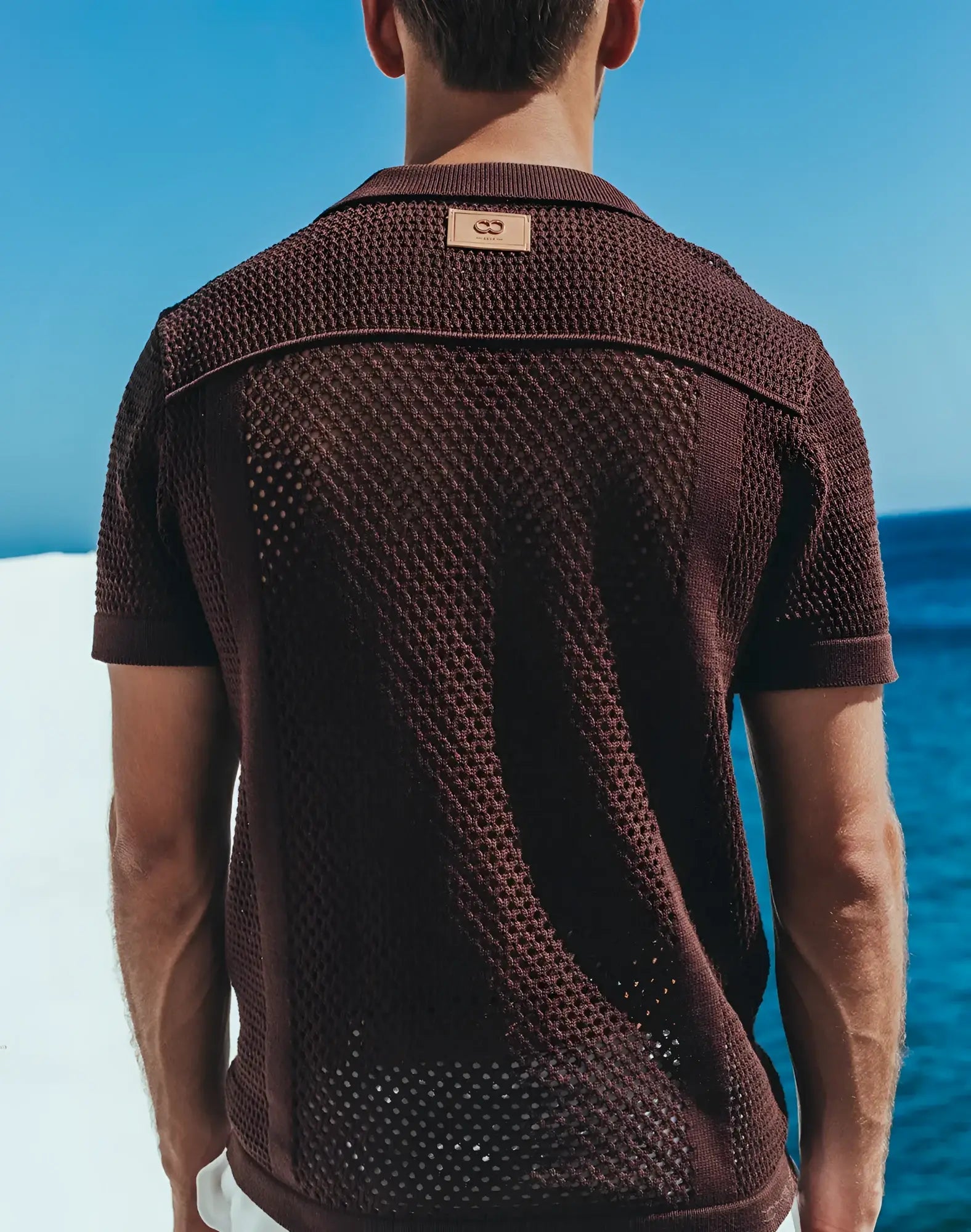Amafi knit shirt brown textured knit polo shirt with subtle woven pattern and leather brand tag at collar