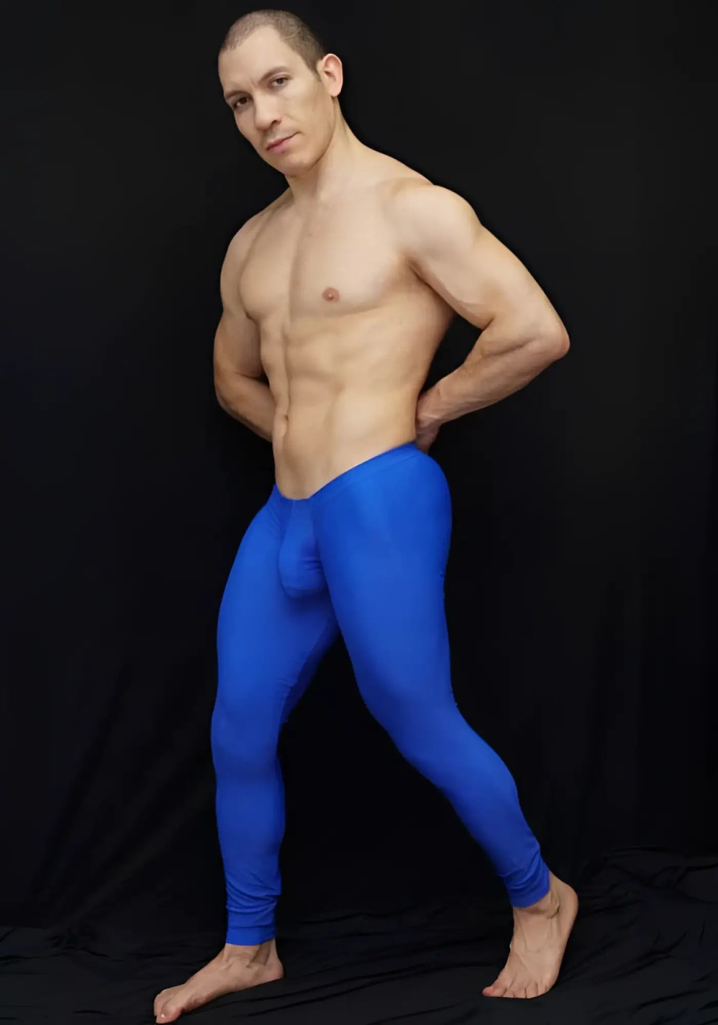 Form-fitting bright blue arroyman bulge runner athletic leggings size m designed for running and active wear