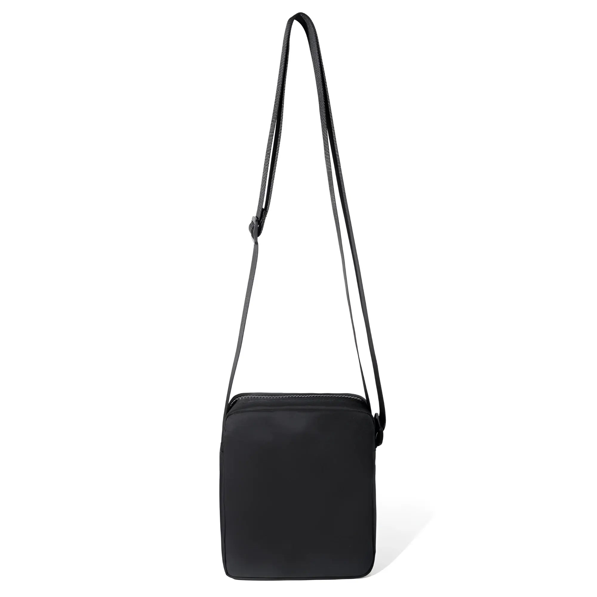 Black rectangular athletic crossbody bag with matching adjustable strap for hands-free carrying and active use