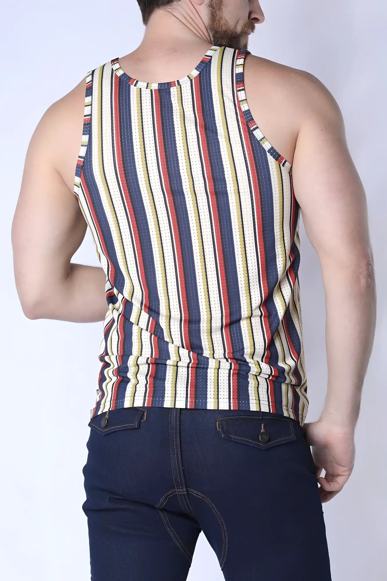 A men’s balboa mesh tank top with vertical navy blue red yellow and cream stripes in sleeveless design