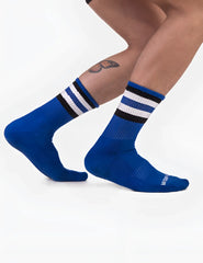 Royal blue barcode berlin fetish stripes half socks with black and white striped cuffs ribbed texture and kathmandu logo on heel