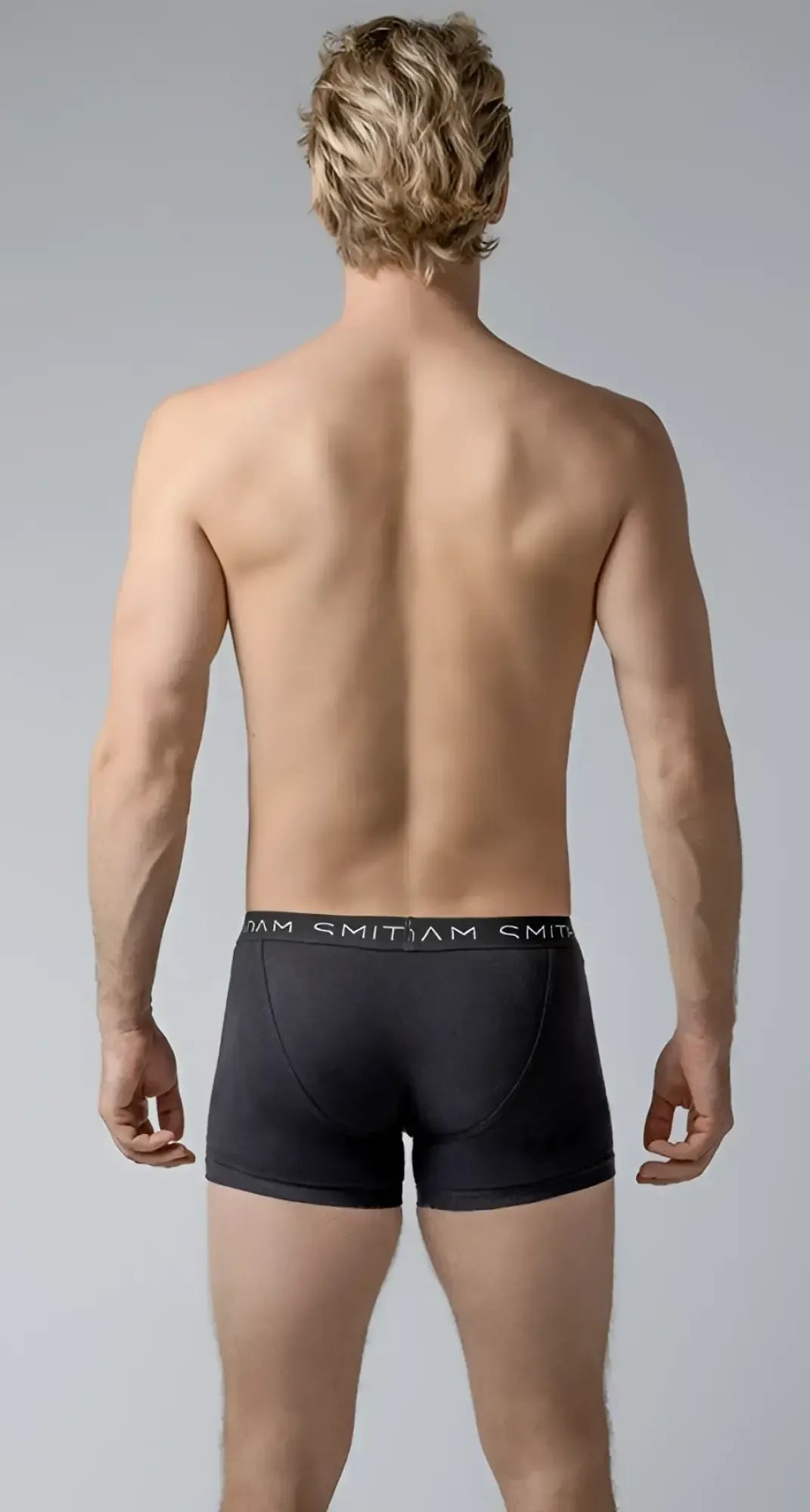 Black menâs briefs basic trunks with a snug fit elastic waistband and smitjam brand name in white lettering