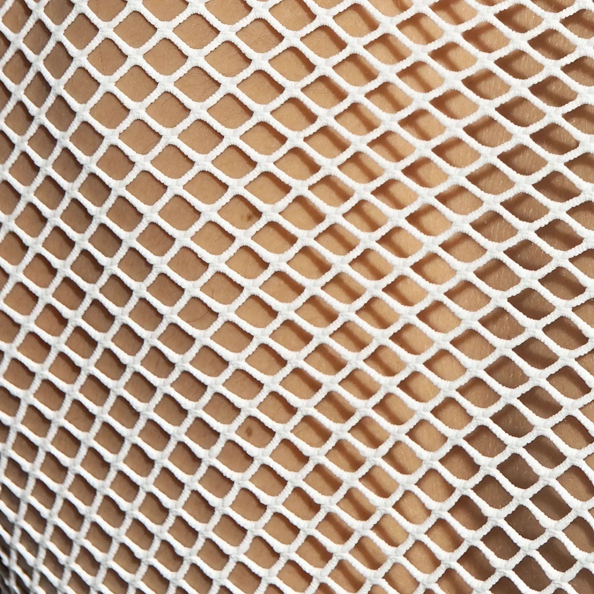 White mesh fabric with a diamond pattern on the beachy net strap tank top front for lightweight summer wear