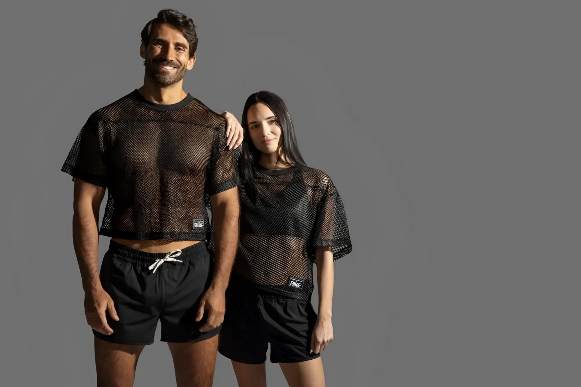 Black mesh crop top with short sleeves and round neckline from bike athletic bam134 practice jersey in bold color black