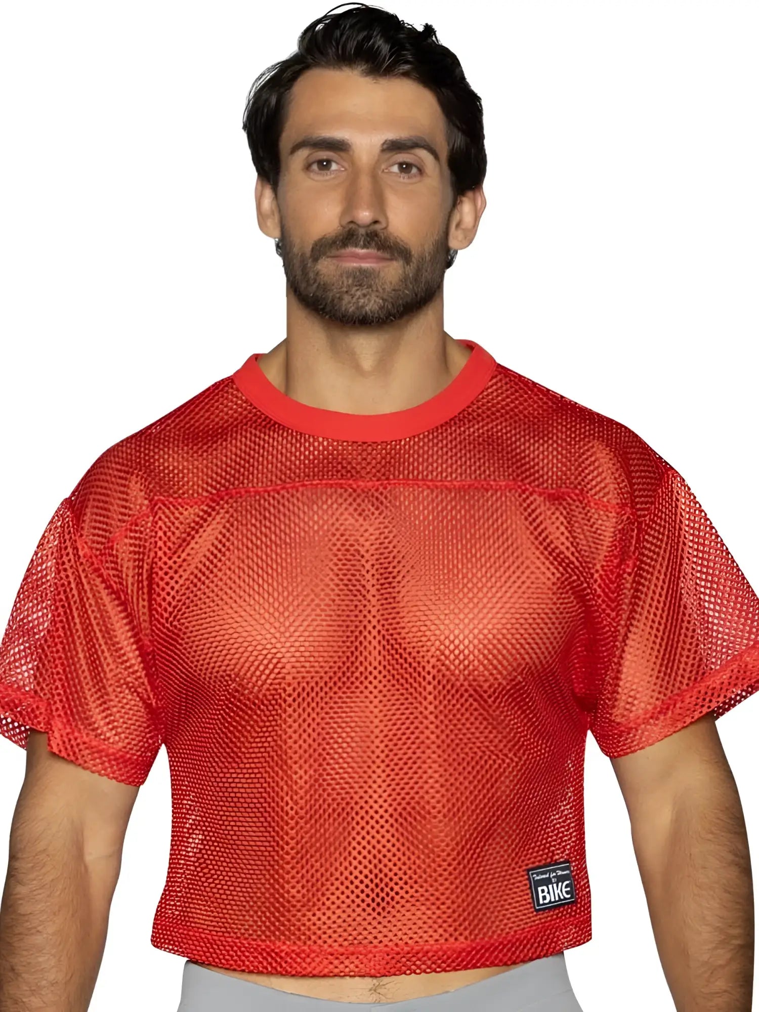 Red mesh crop top with solid red ribbed neckline hem and small black bike brand patch bright red color