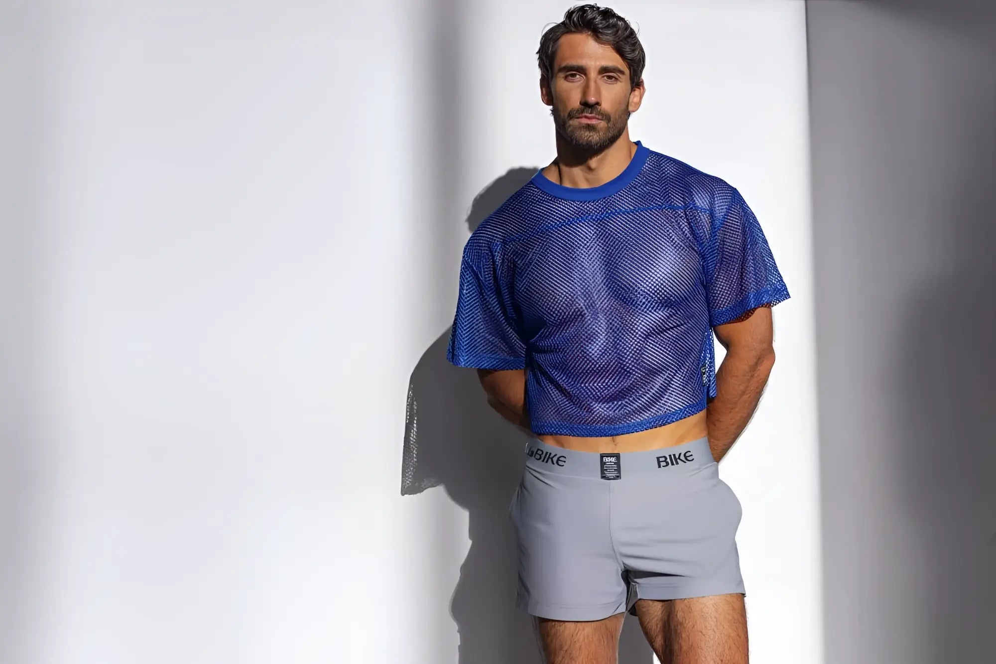 Blue mesh crop top short sleeve practice jersey in royal color made from breathable fabric for athletic use
