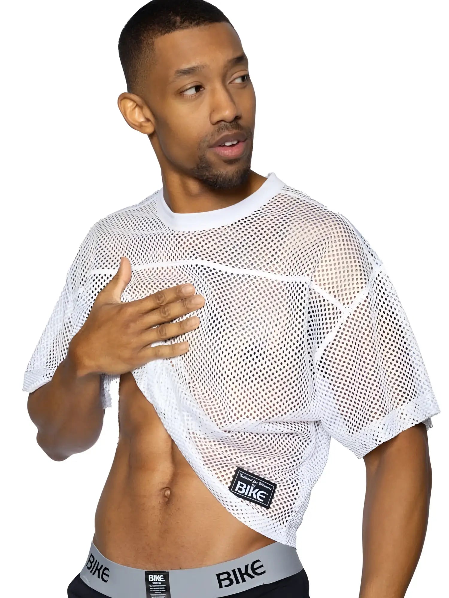 White mesh crop top with black bike logo patch on lower left side athletic short sleeve practice jersey