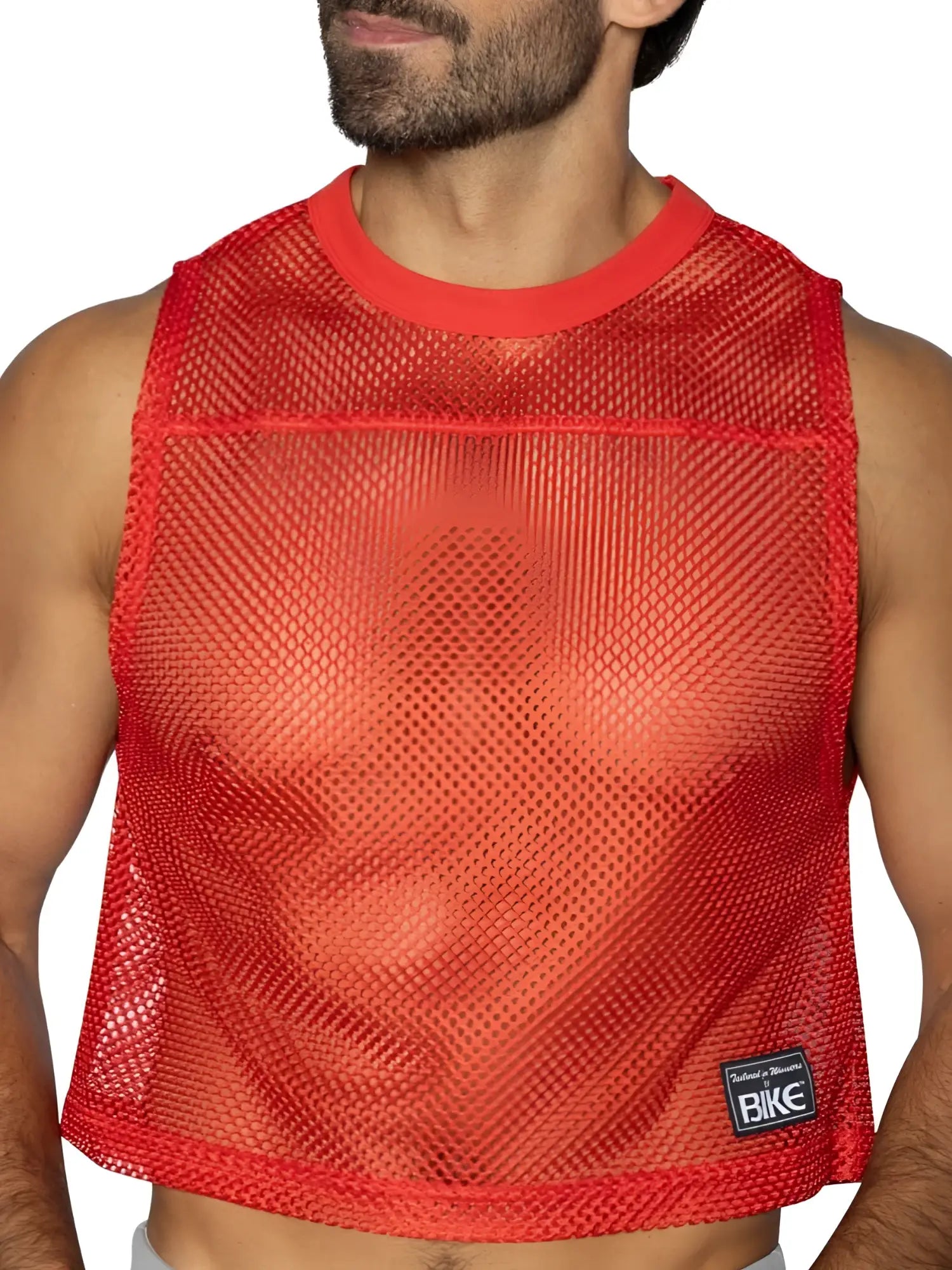 Red mesh crop top with solid red ribbed neckline and hem featuring small black bike brand patch lower right side