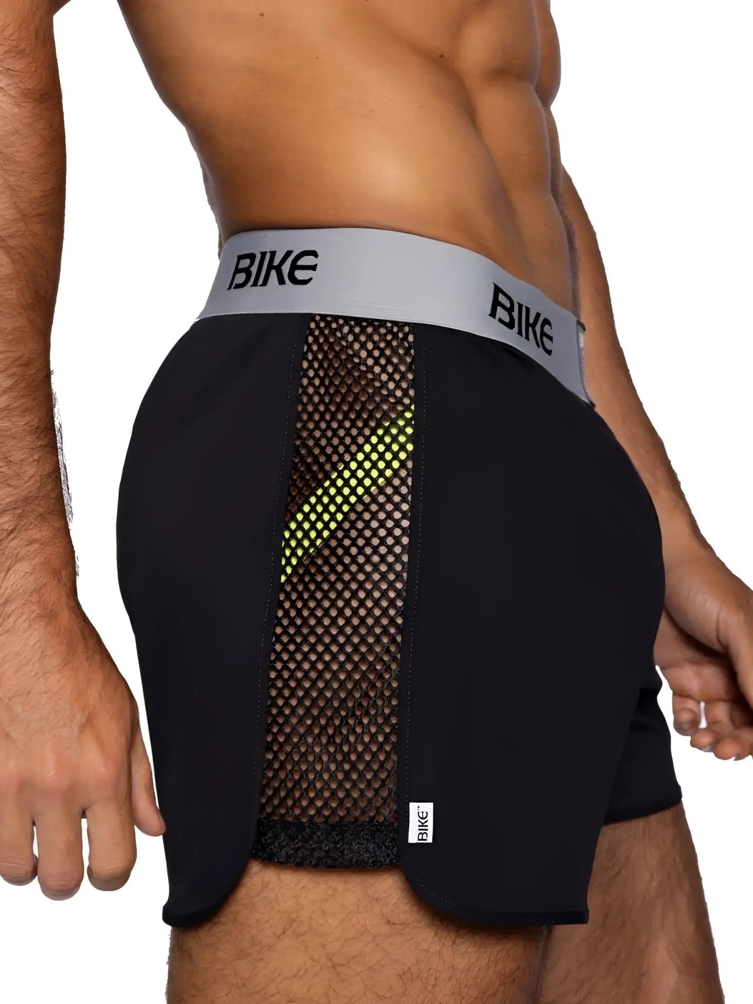 Black bike athletic BAM225 jock shorts with neon green mesh panel and gray branded waistband for active use