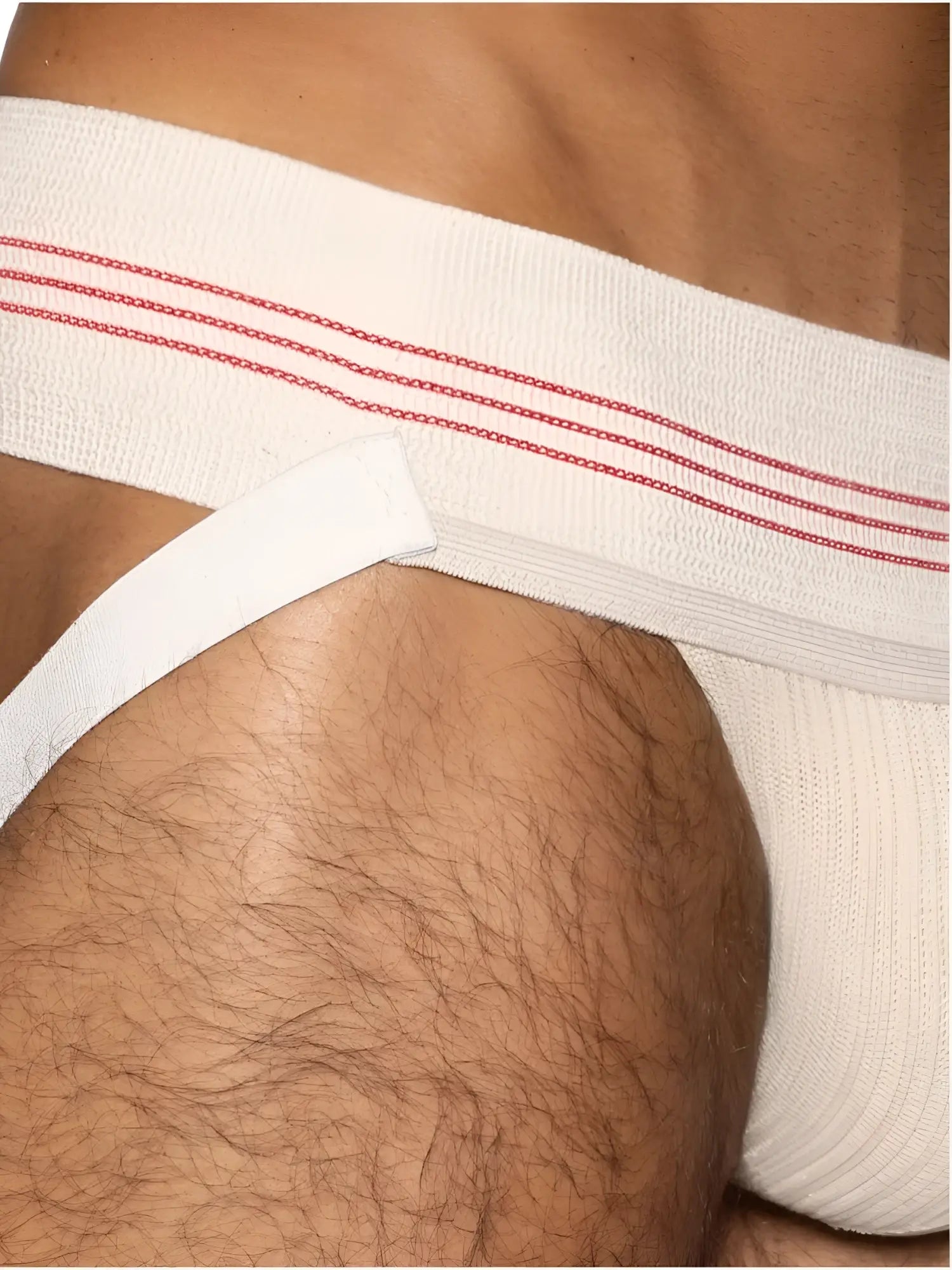 White athletic brief with red stitched stripes across waistband vintage cream color classic retro jockstrap