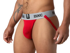 Red bike classic jockstrap with gray waistband and black logo designed for support and comfort during sports activities