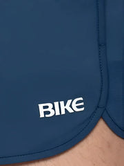 Dark blue bike track short with white bike logo embroidered on the side ideal for athletic use