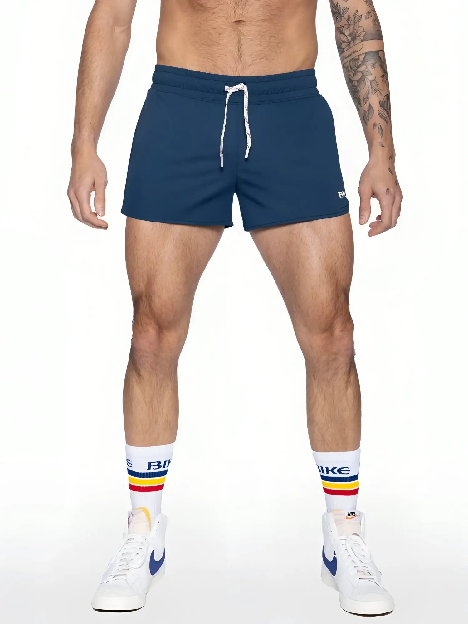 Navy blue bike track short with white drawstrings and a small logo on the lower right leg for athletic wear