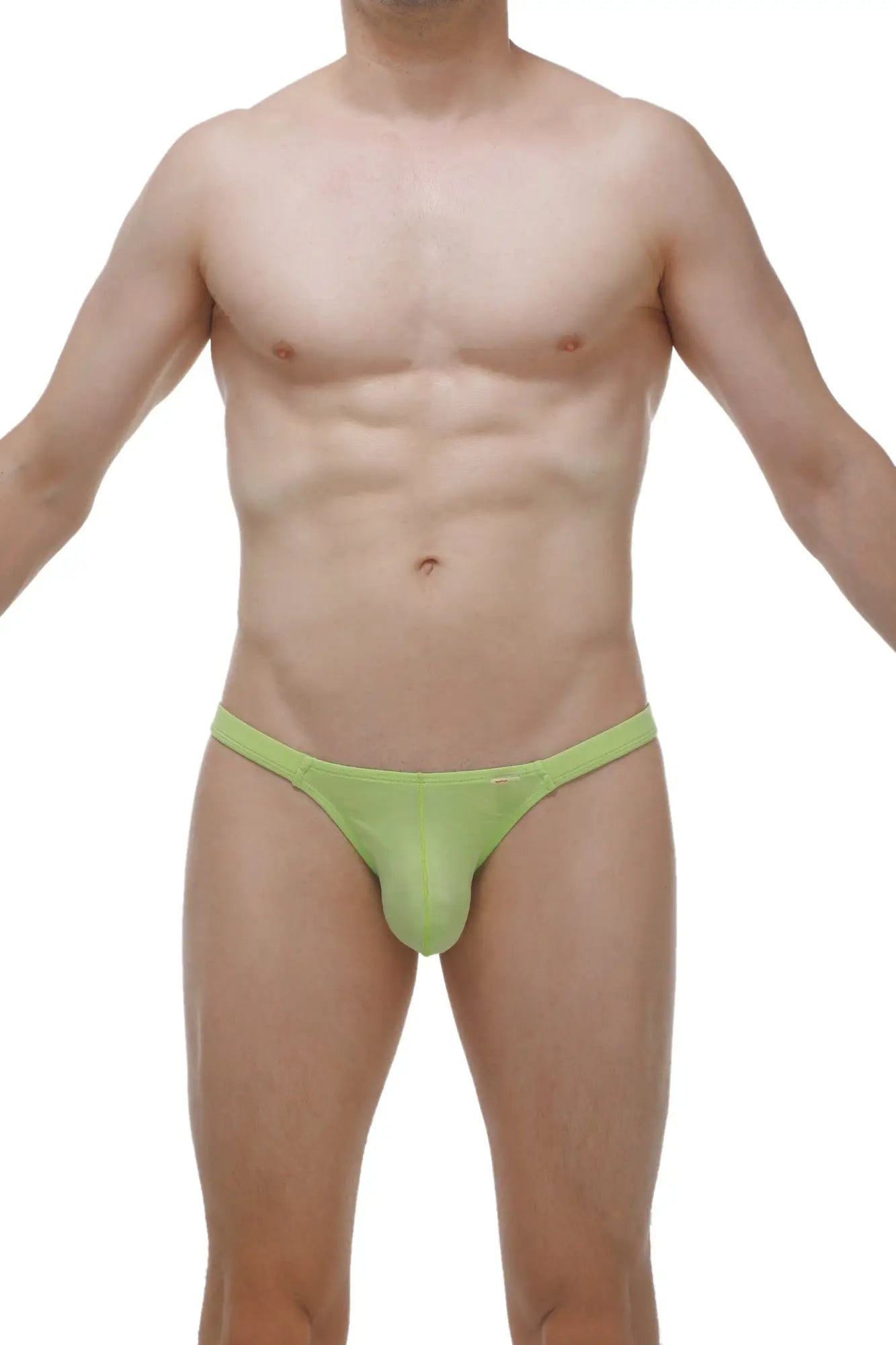 A lime green form-fitting thong made of smooth stretchy fabric shown from the back in the bikini bessas bamboo apple green collection