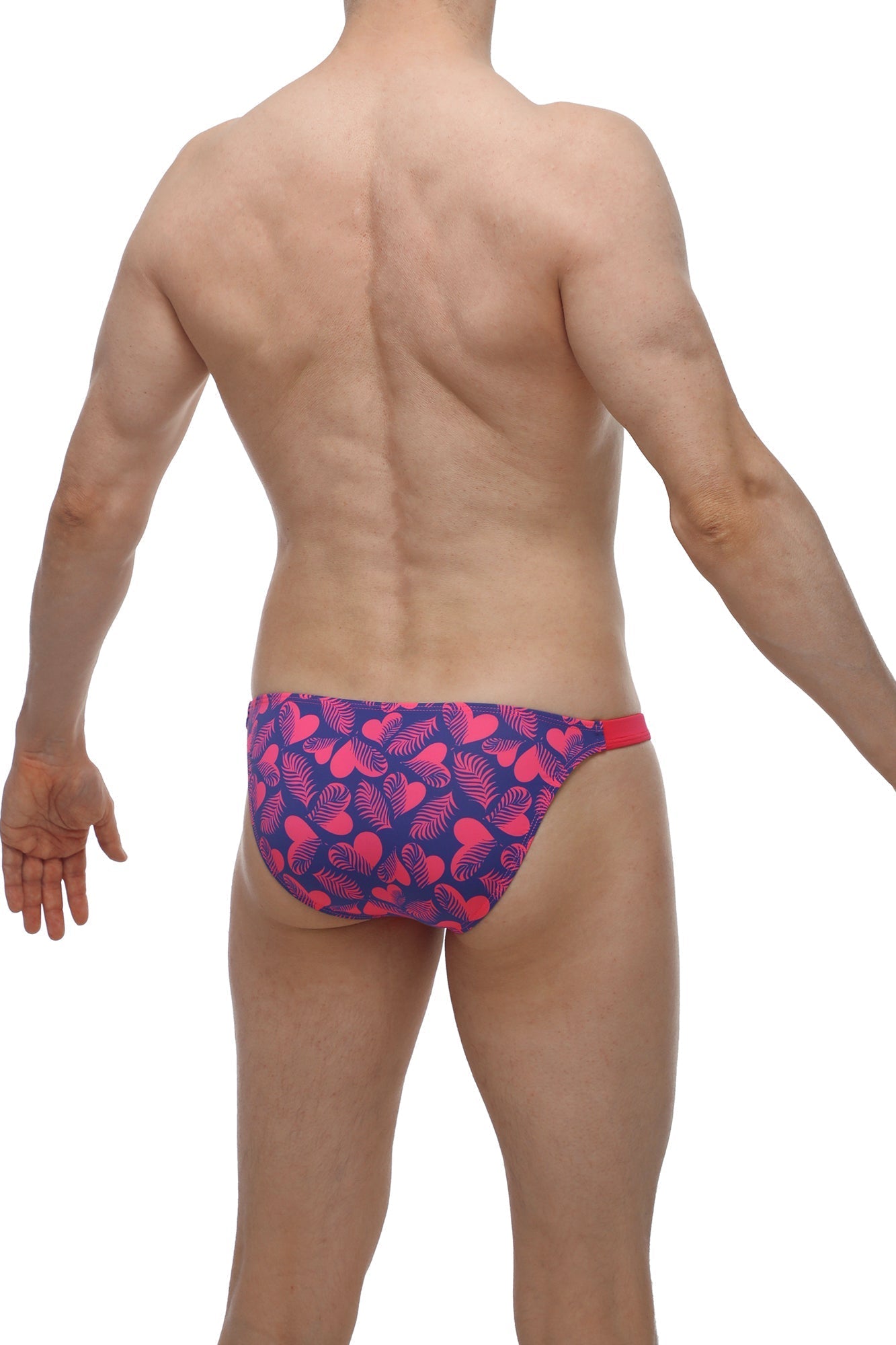 Petitq bikini bessas tropical hearts vibrant pink and navy swim trunks with bold heart leaf pattern and red waistband