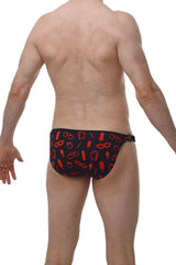 Black swim trunks from petitq bikini chains boudoir with bold red playful mask and handcuff pattern
