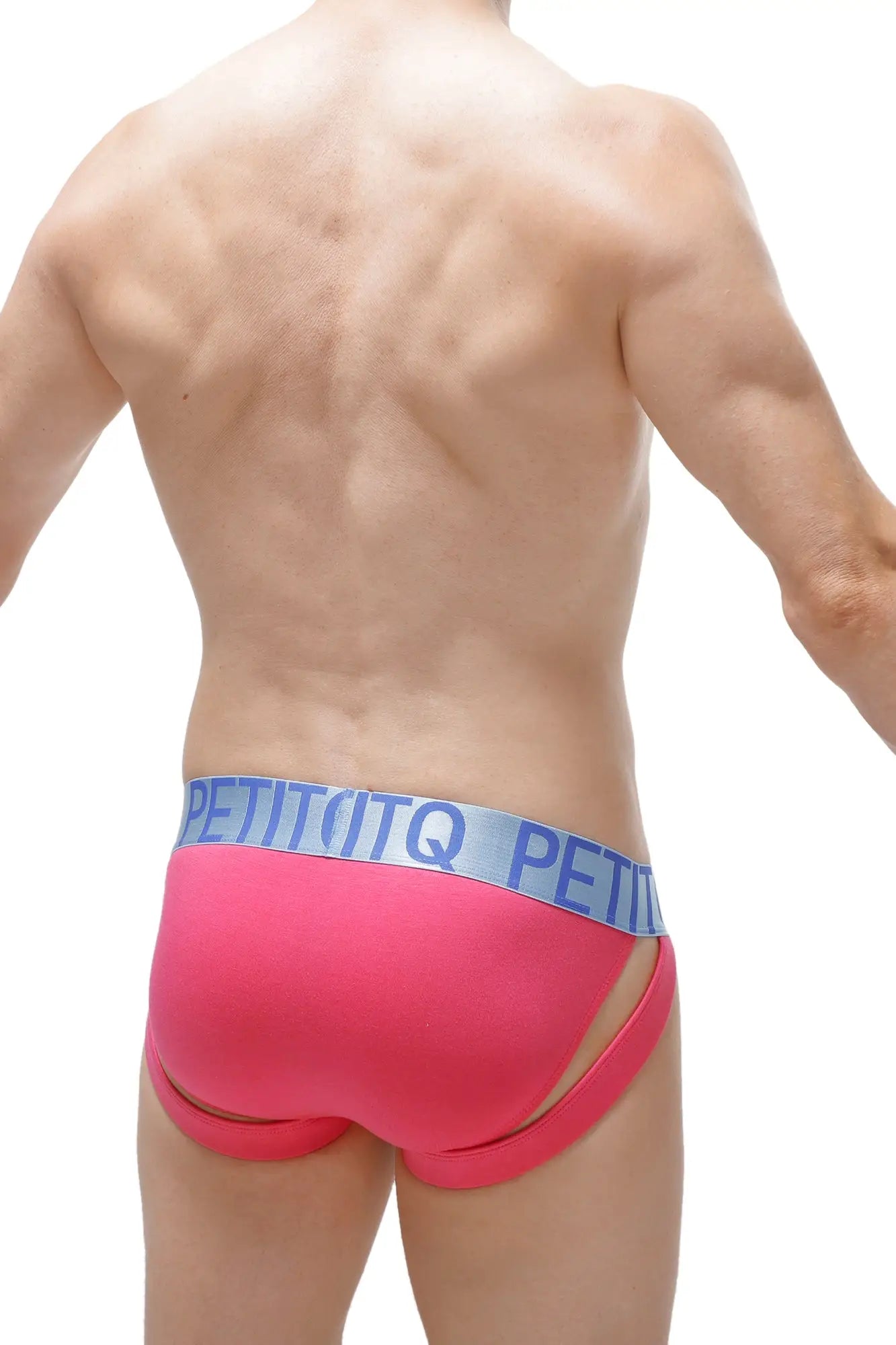 Bright pink petitbjörn bikini jockstrap in modal fabric with light blue elastic waistband and bold brand name