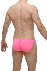 Bright pink form-fitting bikini lhery bulan swim trunks with a ruched back design shown from the back side