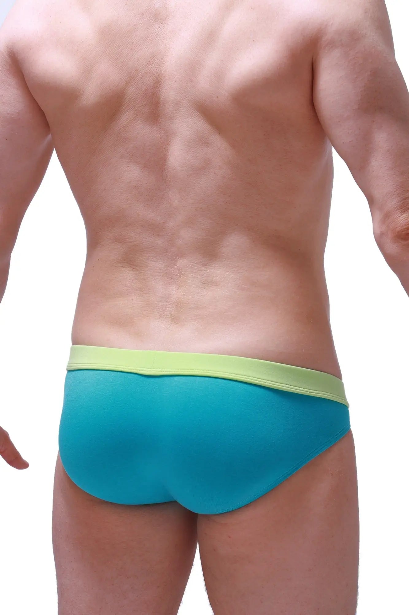 Bikini Manlay Tropical Green turquoise and lime green swim trunks with snug form fitting design for swimming and beachwear