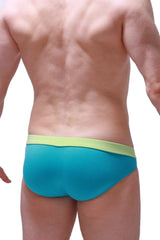 Bikini Manlay Tropical Green turquoise and lime green swim trunks with snug form fitting design for swimming and beachwear