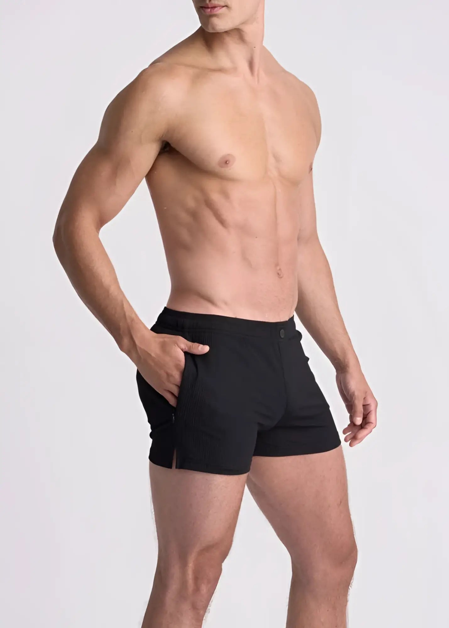 Black seersucker swim shorts with mesh lining in sleek form fitting design and side pockets