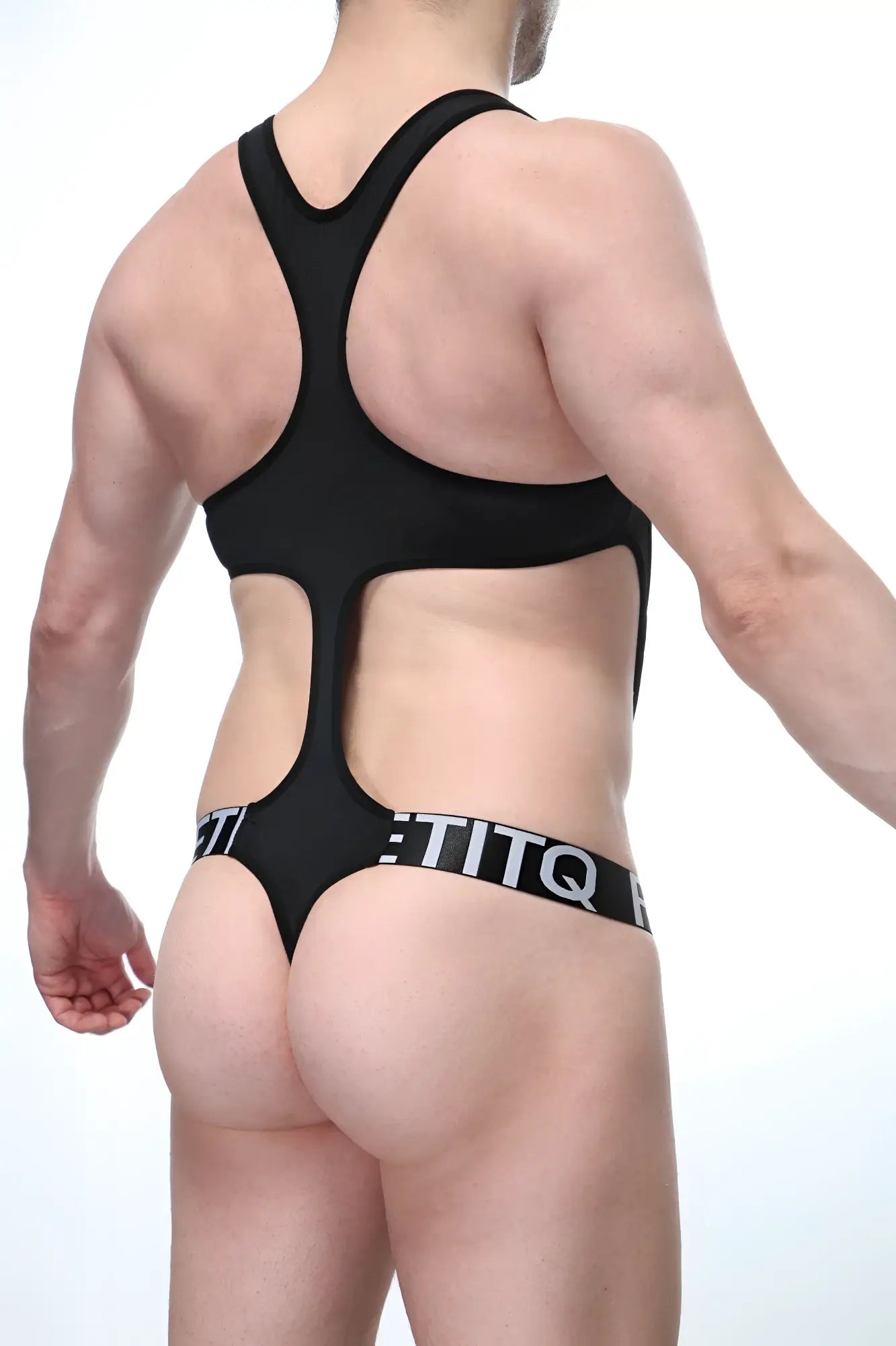 Bodythong Oze black racerback bodysuit by Black titq with cutout details showcasing the back side design