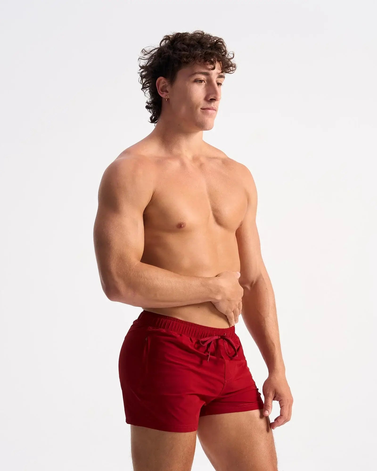 Red bolt 3 inch athletic shorts with drawstring waistband designed for lightweight activewear use