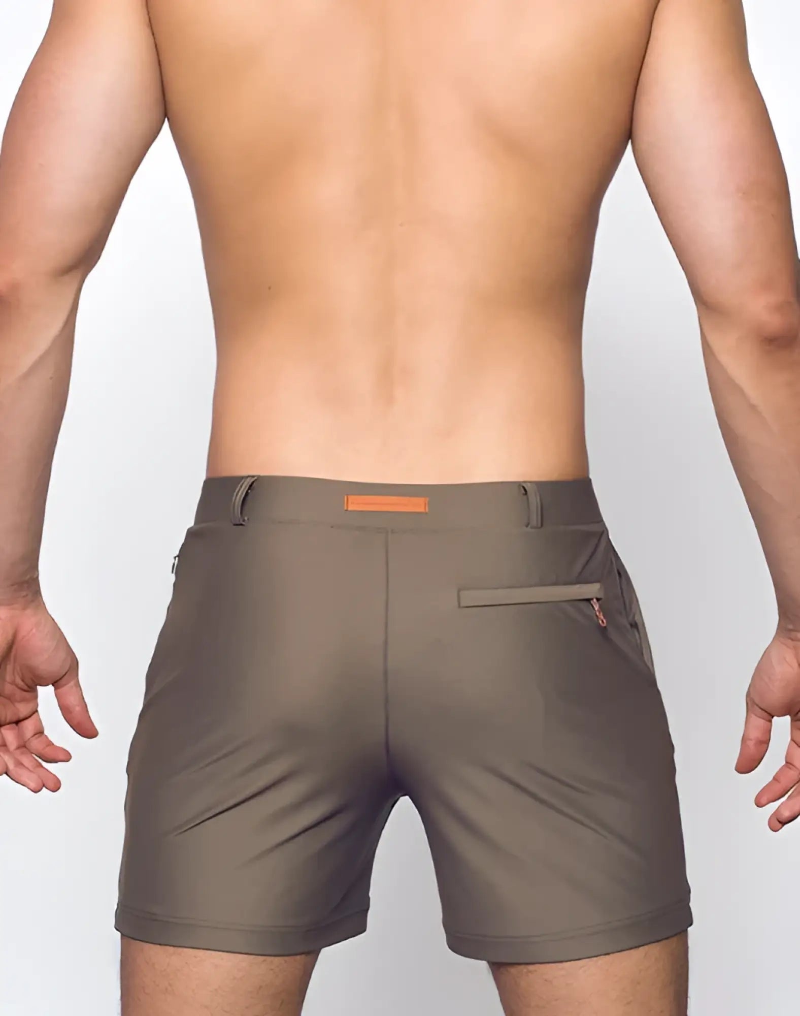 Olive green bondi shorts featuring a subtle orange belt loop and zipper pocket detail for casual wear