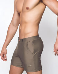 A pair of olive green bondi short athletic shorts with a form-fitting design and subtle metallic logo on the lower left leg