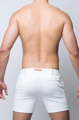 White Bondi short athletic shorts with subtle texture and small brown leather patch at waistband