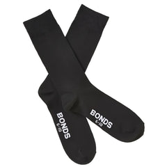 Black cotton bonds everyday oxford crew socks size 6-10 showing white branding on heel back side view