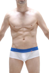 White boxer brief antras with a solid blue waistband and a small red logo on the front for comfortable wear