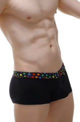 Black boxer coudoux briefs with a colorful rainbow star pattern along the waistband front view
