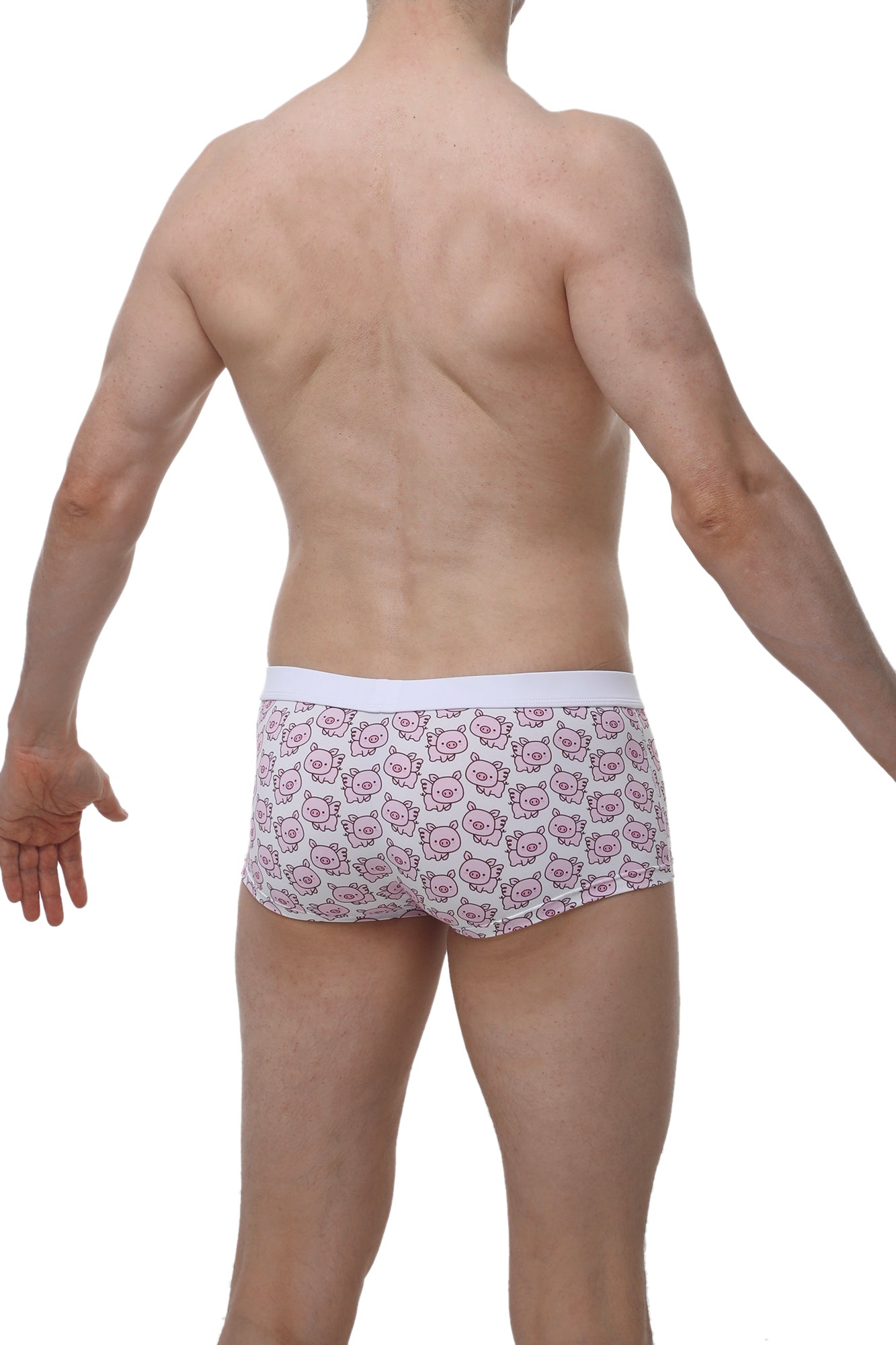 White PetitQ boxer briefs with pink cartoon pig pattern on light fabric ideal for comfortable everyday wear