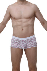 White briefs by petitq boxer meljac piggy love featuring a repeating pattern of pink cartoon pig faces