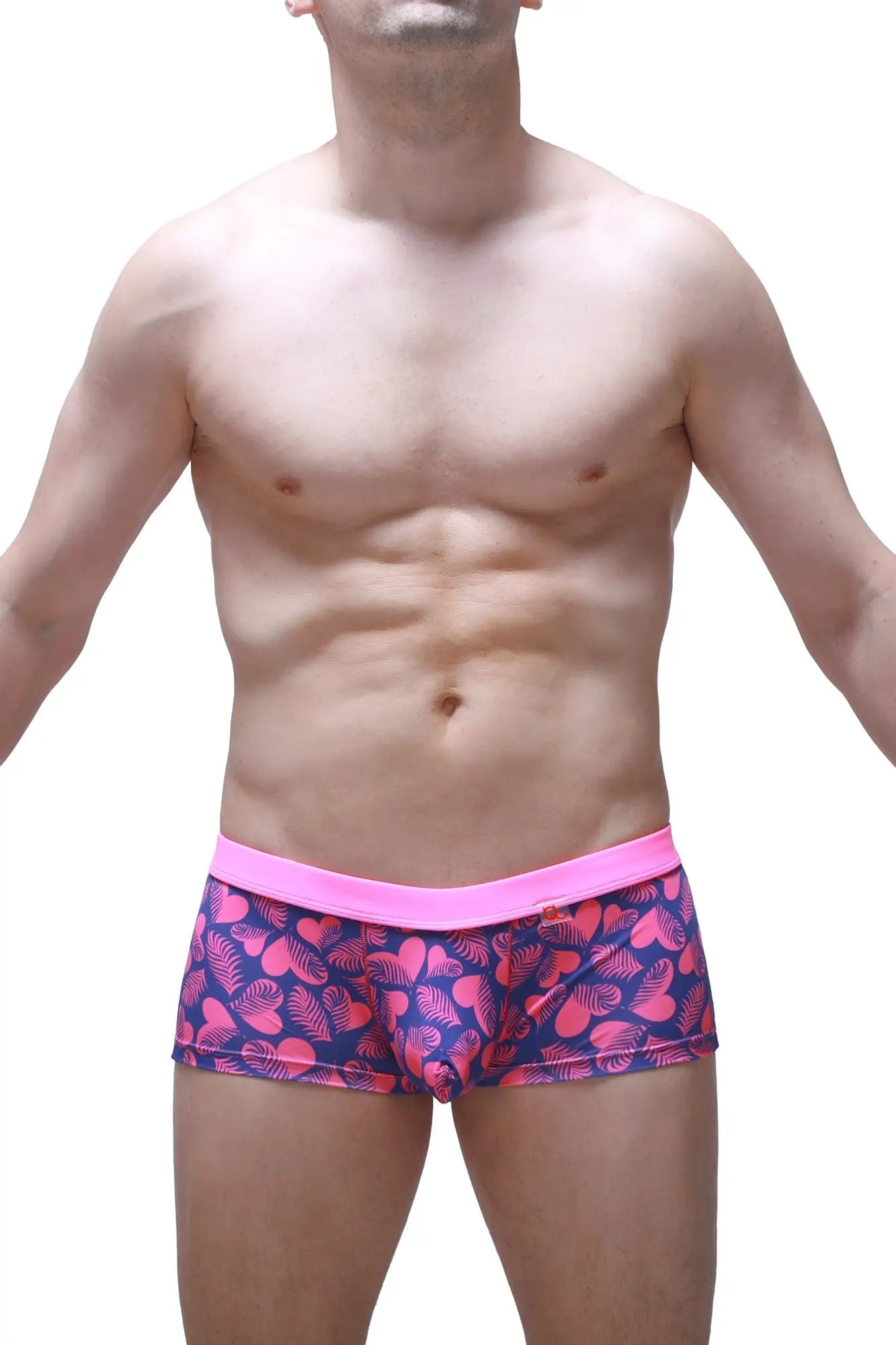 Men’s boxer Meljac tropical hearts briefs with vibrant pink and navy tropical leaf pattern and bright pink waistband