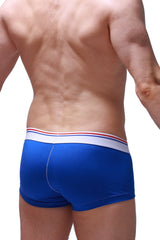 Blue men’s modal boxer briefs with white waistband and red and blue stripes for comfortable everyday wear