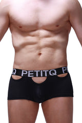 Black petitq boxer briefs with bold white logo band and distinctive cutout details for comfortable support