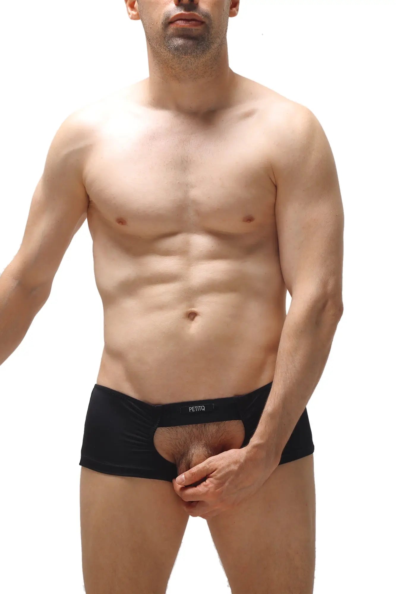 Black men’s boxer sling melin briefs with central cutout and feitto embroidered waistband in black fabric