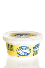 Yellow-labeled plastic container of Boy Butter original formula personal lubricant with clear lid and blue branding