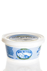 A white plastic container of boy butter water based gel with blue and yellow branding for personal lubrication