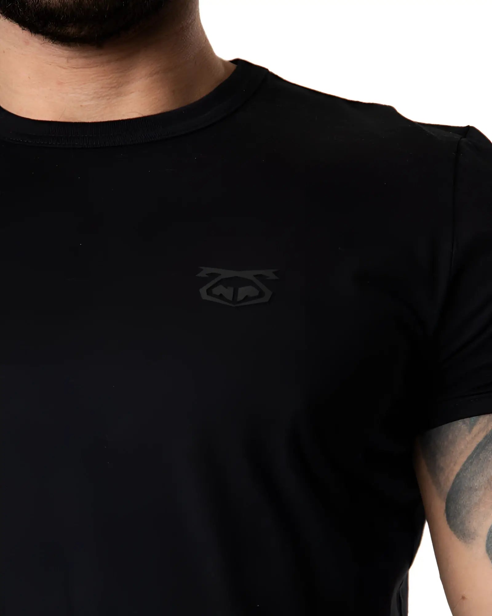 Black crew-neck brandmark tee with subtle dark gray logo on left chest perfect for casual wear