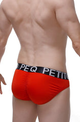 Brief Bulan plum red men’s briefs in red with a black elastic waistband featuring white peq petit lettering