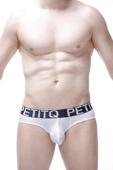 White petitq brand men’s briefs with black waistband featuring brand name in white lettering brief bulan plum white