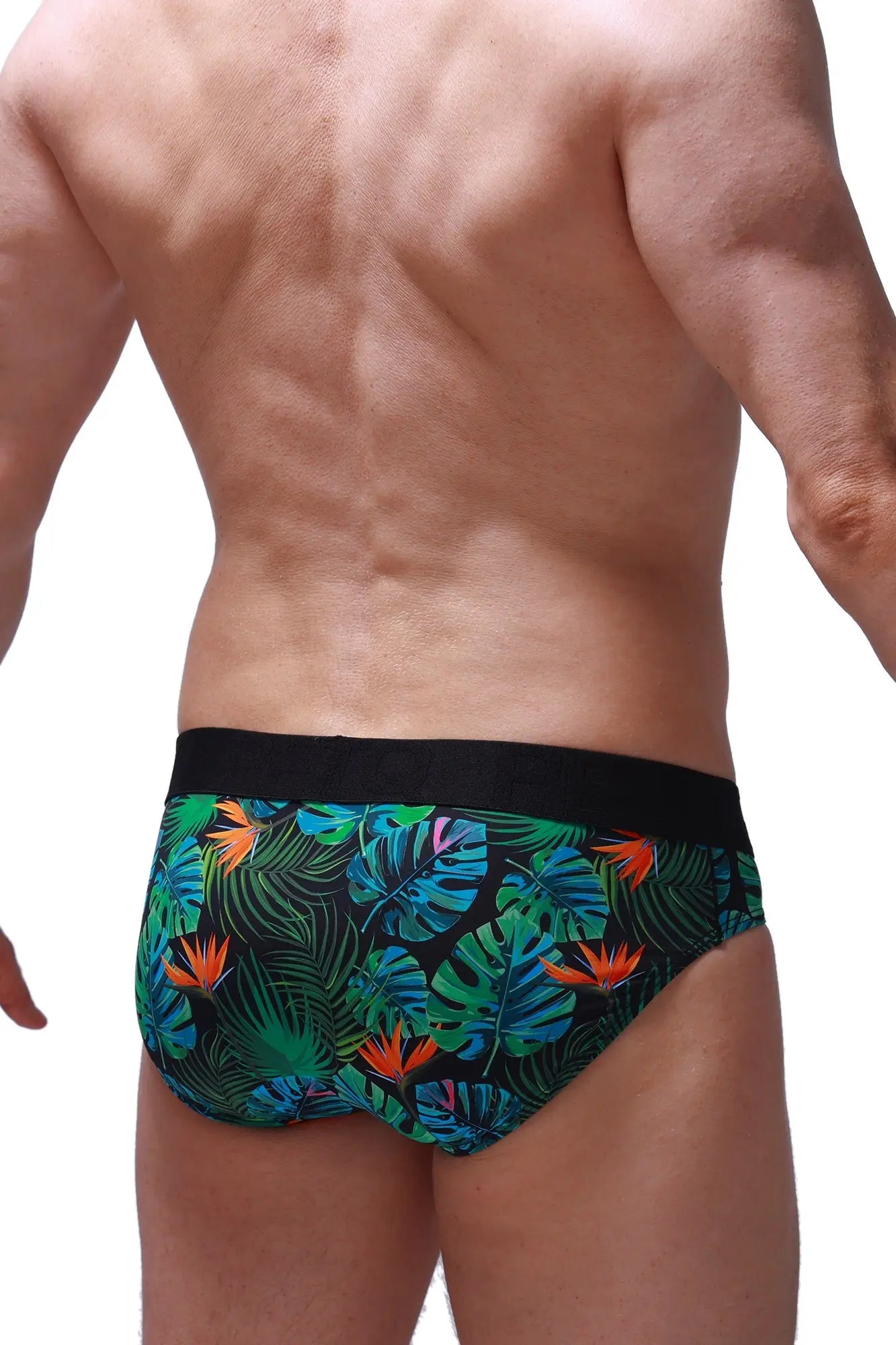 Brief chillax tropical swim trunks with tropical leaf and orange bird pattern and black waistband for beachwear