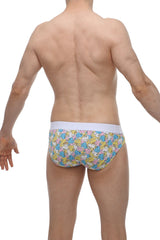 Pastel-colored petitq brief linay duckies with cartoon duck pattern in blue pink and yellow on light fabric with white waistband