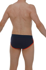 Navy blue swim trunks with orange trim made from retro modal fabric for comfortable beachwear by petitq brief