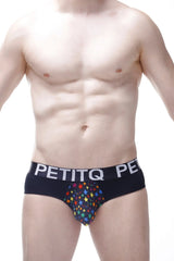Black men’s briefs with colorful star pattern and petitq branding on waistband in brief stars rainbow design