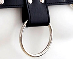 Bulldog harness black leather strap with silver-toned metal ring and rivets for secure dog restraint
